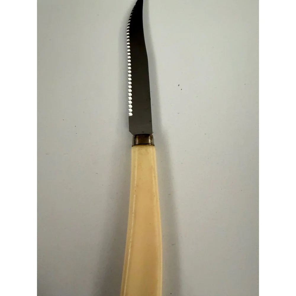 Vintage Quikut Stainless Steel Serrated Steak Knife USA Cream Handle Cutlery